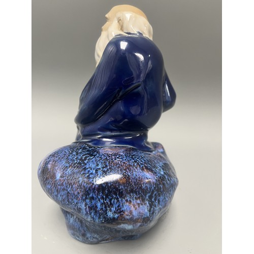 45 - Ceramic Figurine of a Scholar or Immortal with Cobalt and Flambe Glaze. A single ceramic figurine de... 