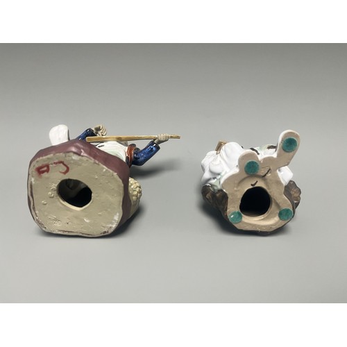 51 - A Pair of Chinese Shiwan Mudman Pottery Figurines, Musician and Scholar. A pair of Chinese Shiwan Mu... 