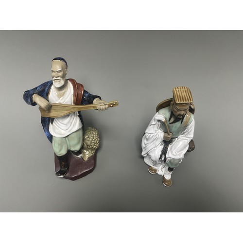 51 - A Pair of Chinese Shiwan Mudman Pottery Figurines, Musician and Scholar. A pair of Chinese Shiwan Mu... 
