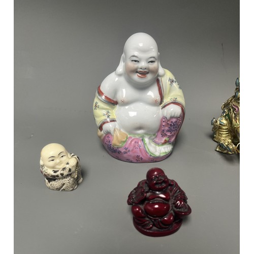 15 - Collection of East Asian Figurines including Porcelain Buddha etc. East Asian figurines including a ... 