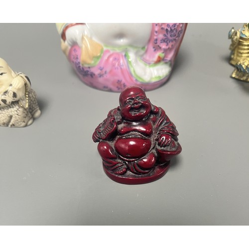 15 - Collection of East Asian Figurines including Porcelain Buddha etc. East Asian figurines including a ... 