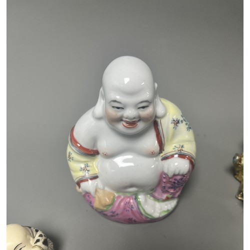 15 - Collection of East Asian Figurines including Porcelain Buddha etc. East Asian figurines including a ... 