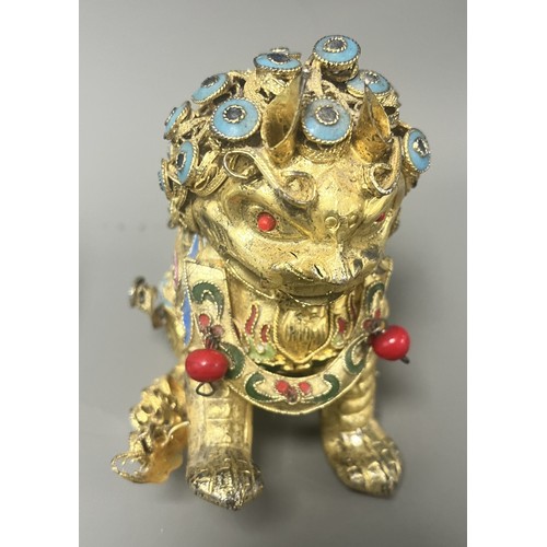 15 - Collection of East Asian Figurines including Porcelain Buddha etc. East Asian figurines including a ... 