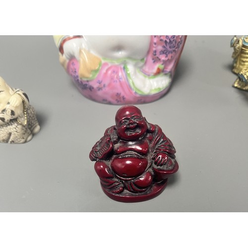 15 - Collection of East Asian Figurines including Porcelain Buddha etc. East Asian figurines including a ... 