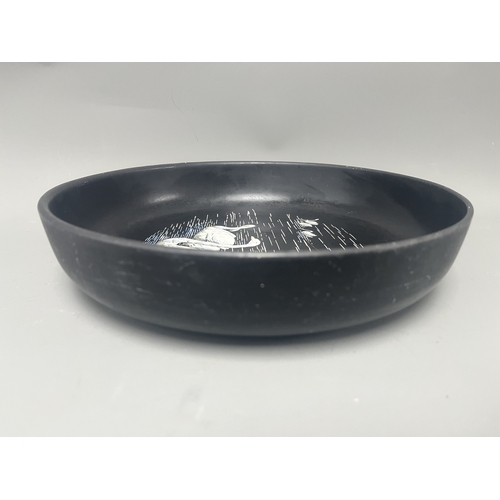 34A - Mintons Black Pottery Bowl with Painted White Swans. A black Mintons pottery bowl featuring a hand-p... 