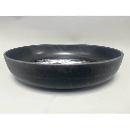 34A - Mintons Black Pottery Bowl with Painted White Swans. A black Mintons pottery bowl featuring a hand-p... 