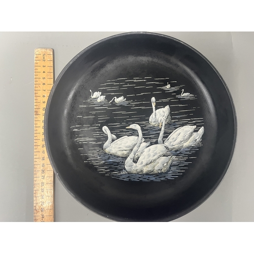 34A - Mintons Black Pottery Bowl with Painted White Swans. A black Mintons pottery bowl featuring a hand-p... 