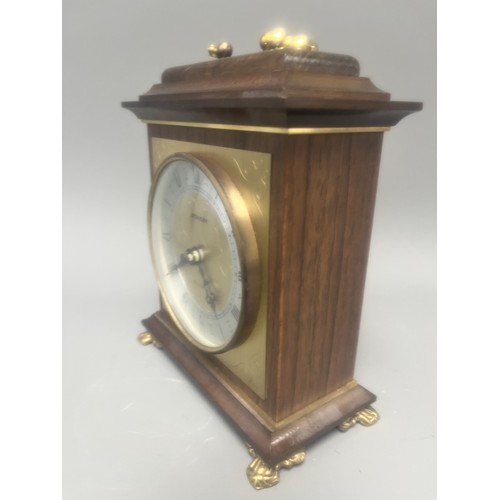 18 - Staiger Wood Cased Quartz Mantel Clock.
A brown wood-cased mantel clock featuring a Staiger quartz m... 
