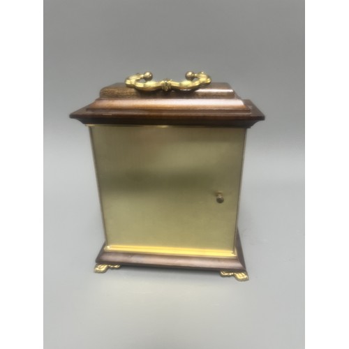 18 - Staiger Wood Cased Quartz Mantel Clock.
A brown wood-cased mantel clock featuring a Staiger quartz m... 