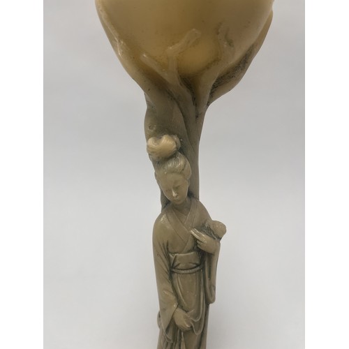 3 - A single decorative figural candle holder or incense burner, produced in the mid-20th century. It is... 