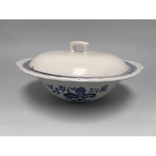 185 - A trio of domestic ceramic kitchen and tableware. The lot includes a deep circular ramekin or souffl... 