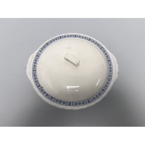 185 - A trio of domestic ceramic kitchen and tableware. The lot includes a deep circular ramekin or souffl... 