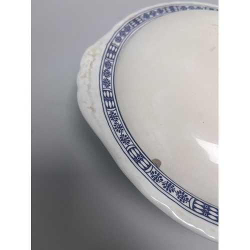 185 - A trio of domestic ceramic kitchen and tableware. The lot includes a deep circular ramekin or souffl... 