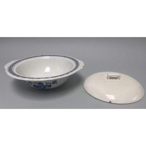 185 - A trio of domestic ceramic kitchen and tableware. The lot includes a deep circular ramekin or souffl... 