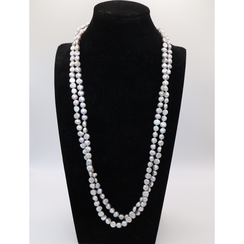 2 - A Collection of three Baroque Freshwater Cultured Pearl Necklaces, with Silver-Tone Clasps