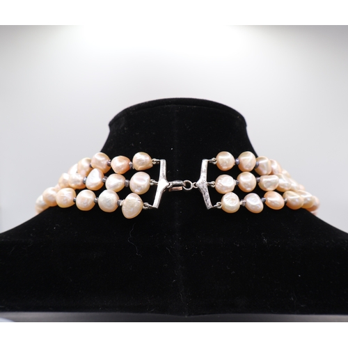 2 - A Collection of three Baroque Freshwater Cultured Pearl Necklaces, with Silver-Tone Clasps