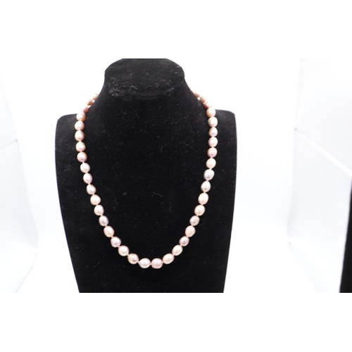 2 - A Collection of three Baroque Freshwater Cultured Pearl Necklaces, with Silver-Tone Clasps