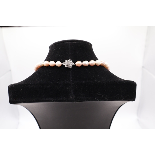 2 - A Collection of three Baroque Freshwater Cultured Pearl Necklaces, with Silver-Tone Clasps