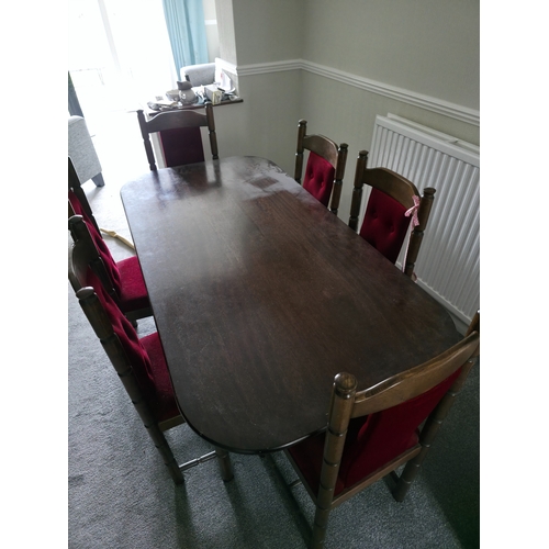 41 - A Seven-Piece Jacobean Revival Style Dining Suite