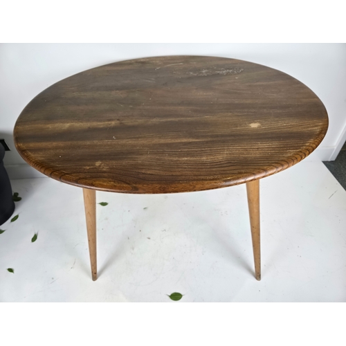 42 - Ercol Oval Breakfast Table With Magazine Shelf
