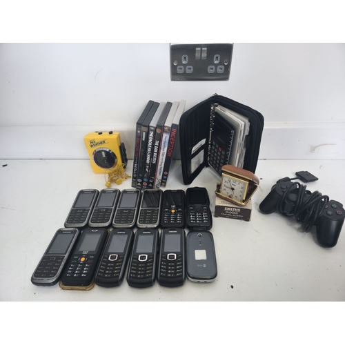137 - Good collection of Samsung mobile phones, CAT phones, All Weather vintage radio cassette player, pla... 
