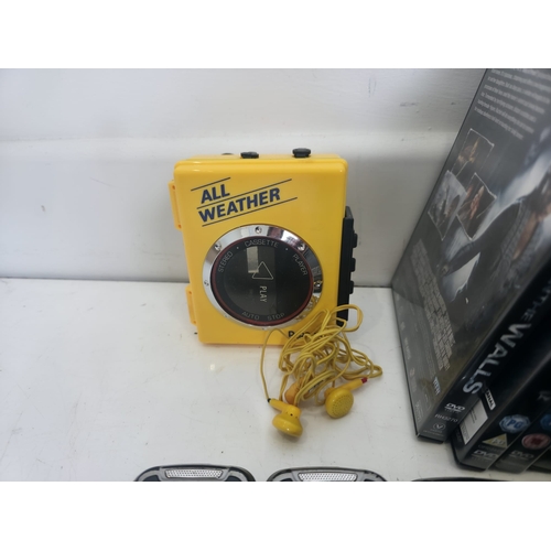 137 - Good collection of Samsung mobile phones, CAT phones, All Weather vintage radio cassette player, pla... 