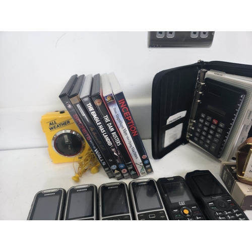 137 - Good collection of Samsung mobile phones, CAT phones, All Weather vintage radio cassette player, pla... 