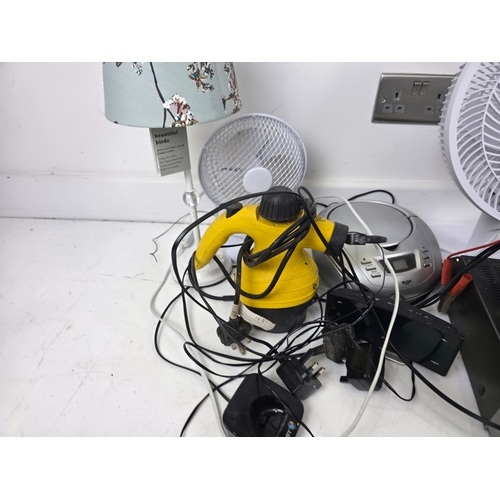 140 - Mixed Small Electrical Appliances & AV Equipment Including Bush Fan, Radio and Battery Chargers