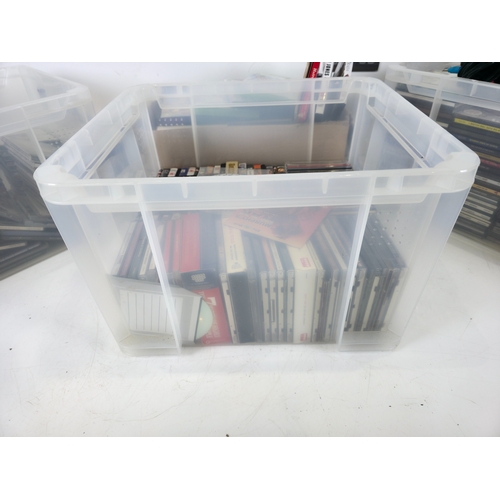 143 - Three large Storage Tubs of CDs, DVDs, PS2 Console, Games & Accessories and more (tubs not included)