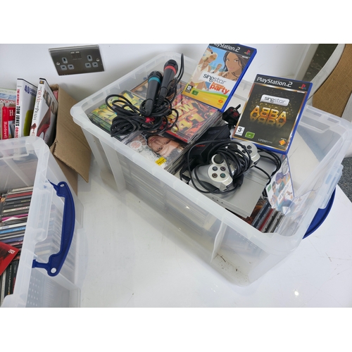 143 - Three large Storage Tubs of CDs, DVDs, PS2 Console, Games & Accessories and more (tubs not included)