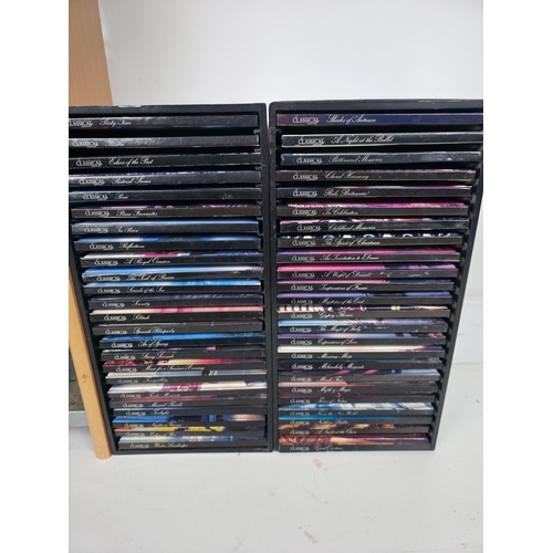 144 - Large Collection of CD's and Dvds. Together with CD Storage Rack