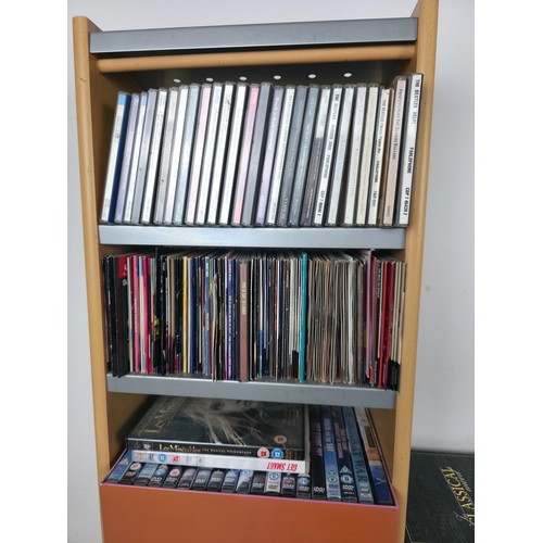 144 - Large Collection of CD's and Dvds. Together with CD Storage Rack