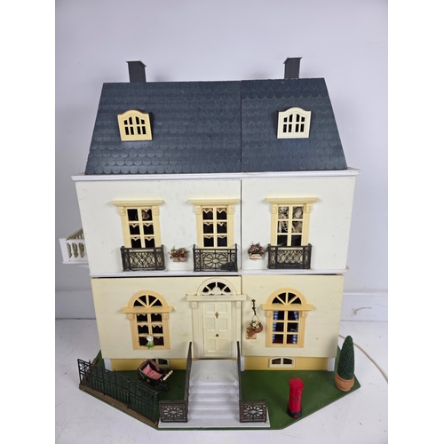 152 - Large Three Story Dolls House with Balconies and Interior Detail and Accessories Illuminated