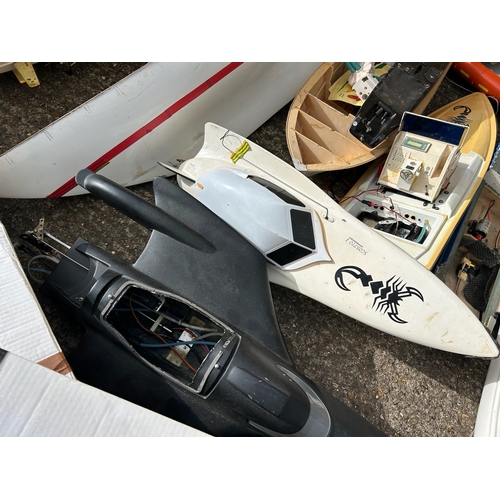 155 - Substantial quantity of remote control boats in various stages of build, wooden and plastic hulled s... 