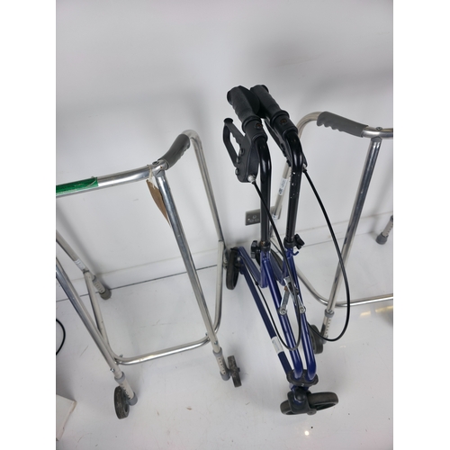 177 - Three Mobility Aids Including Two Aluminium Framed Walkers and a Folding Wheeled Walker