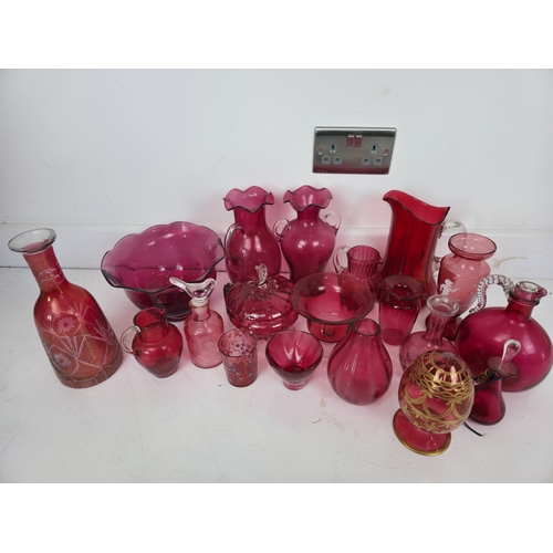 191 - Large Collection of Cranberry Glass Including Jugs, Bowls and Vases