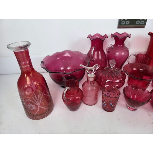 191 - Large Collection of Cranberry Glass Including Jugs, Bowls and Vases