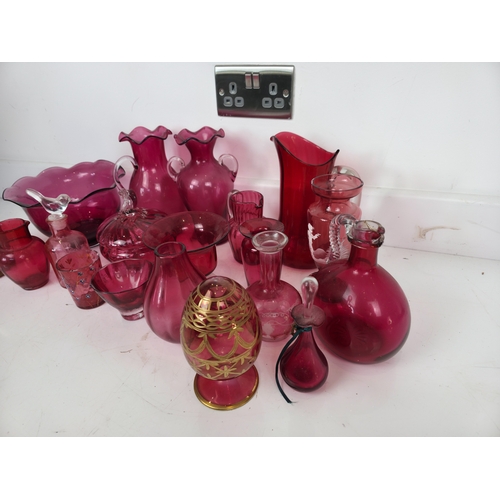191 - Large Collection of Cranberry Glass Including Jugs, Bowls and Vases