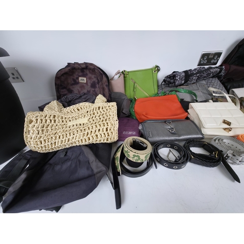 251 - Large quantity of (mostly ladies) handbags, belts and accessories including known brands