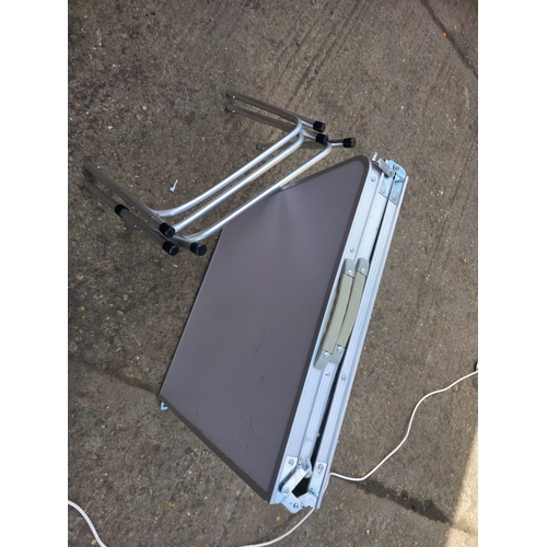 32 - Assorted Outdoors equipment, Tilley lamp, together with a 3 part folding camping table