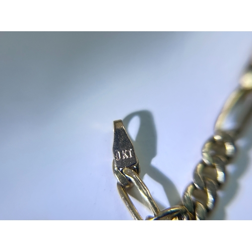 11 - Italian Figaro chain crafted in 9 Carat Gold, stamped Italy with import marks and a gross weight of ... 