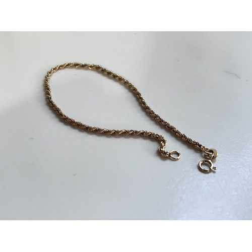 12 - Rope chain set in 9 Carat gold with full British hallmarks and gross weight of circa 1g