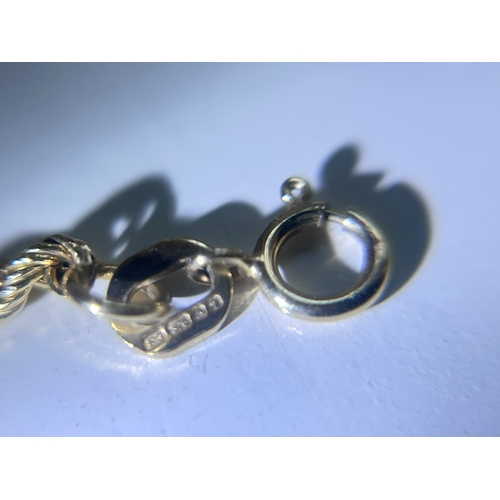 12 - Rope chain set in 9 Carat gold with full British hallmarks and gross weight of circa 1g