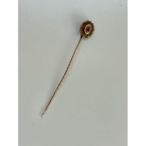 18 - Victorian stick pin, set with a Garnet.