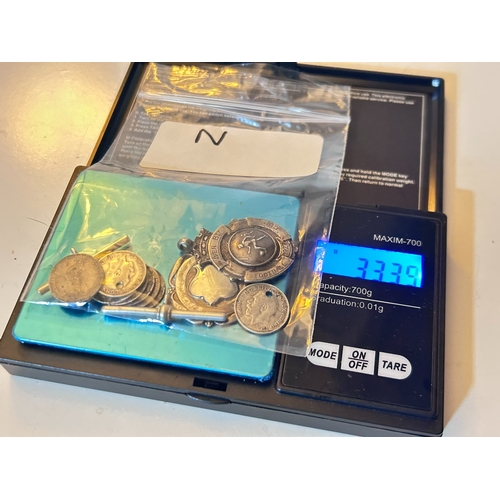 27 - Various Silver items including Sterling Silver Albert Fob Shield, Sterling Silver hallmarked medal, ... 