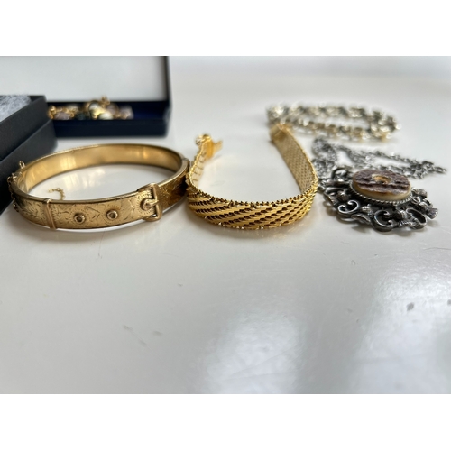 39 - Good collection of costume jewellery, including bangles, necklaces, brooch, bracelet, by Swarovski a... 