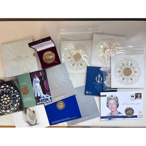 51 - An interesting collection of commemorative coins including the Queens Diamond Jubilee, the opening o... 