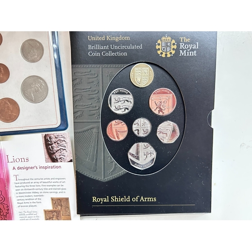 52 - A collection of uncirculated coins and one five pound coin (Â£5), including pre decimal and decimal ... 