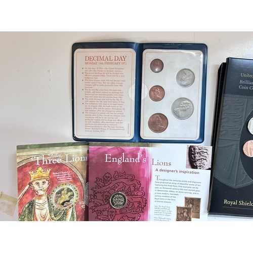 52 - A collection of uncirculated coins and one five pound coin (Â£5), including pre decimal and decimal ... 