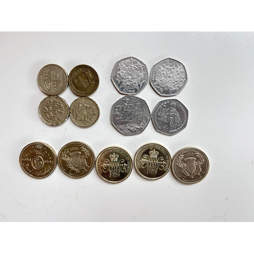 53 - A collectable lot of of vintage one pound (Â£1) and fifty pence (50p) pieces, including highly sough... 